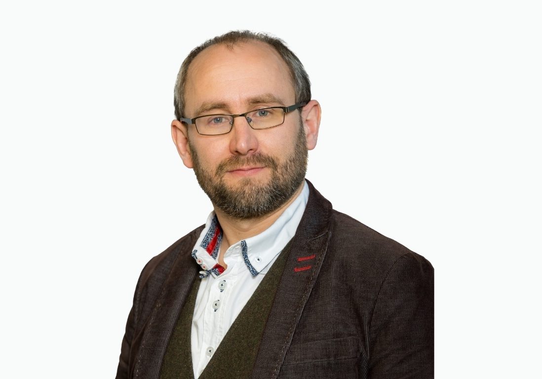 Matthew Millyard head and shoulder shot against a dust coloured background