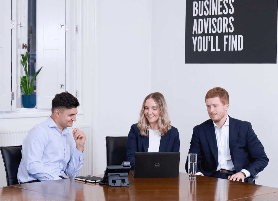 Image of AAB team members having a meeting about tax