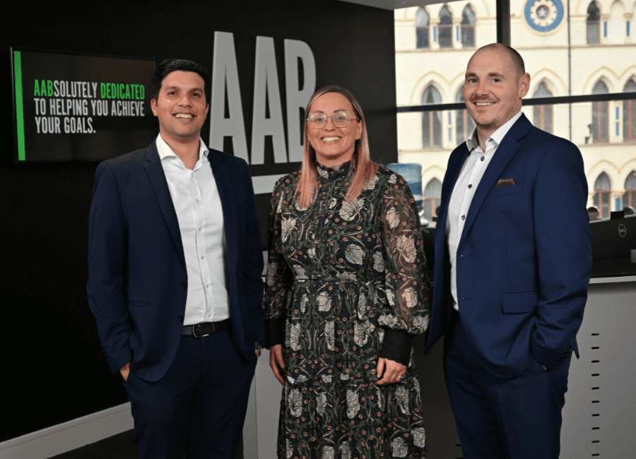 AAB invests in talent, partner promotion picture with Ashok Thomas, Debbie Mullen, and Shane Martin