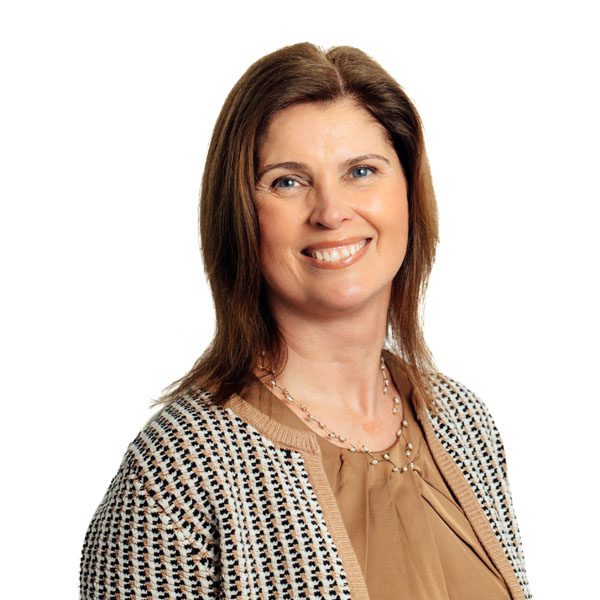 Lorraine Quinn smiling to camera.