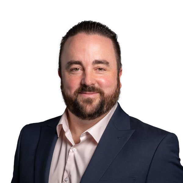 Adam Flight looking towards camera.