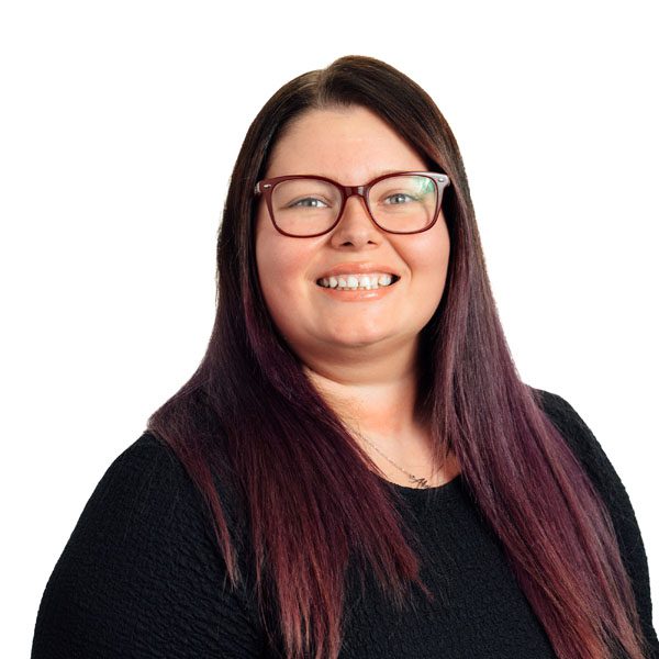 Danielle McInnoy smiling at camera.