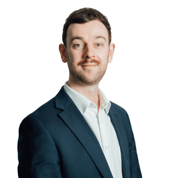 An image of Steven McCormick wearing a dark blazer and a white shirt.